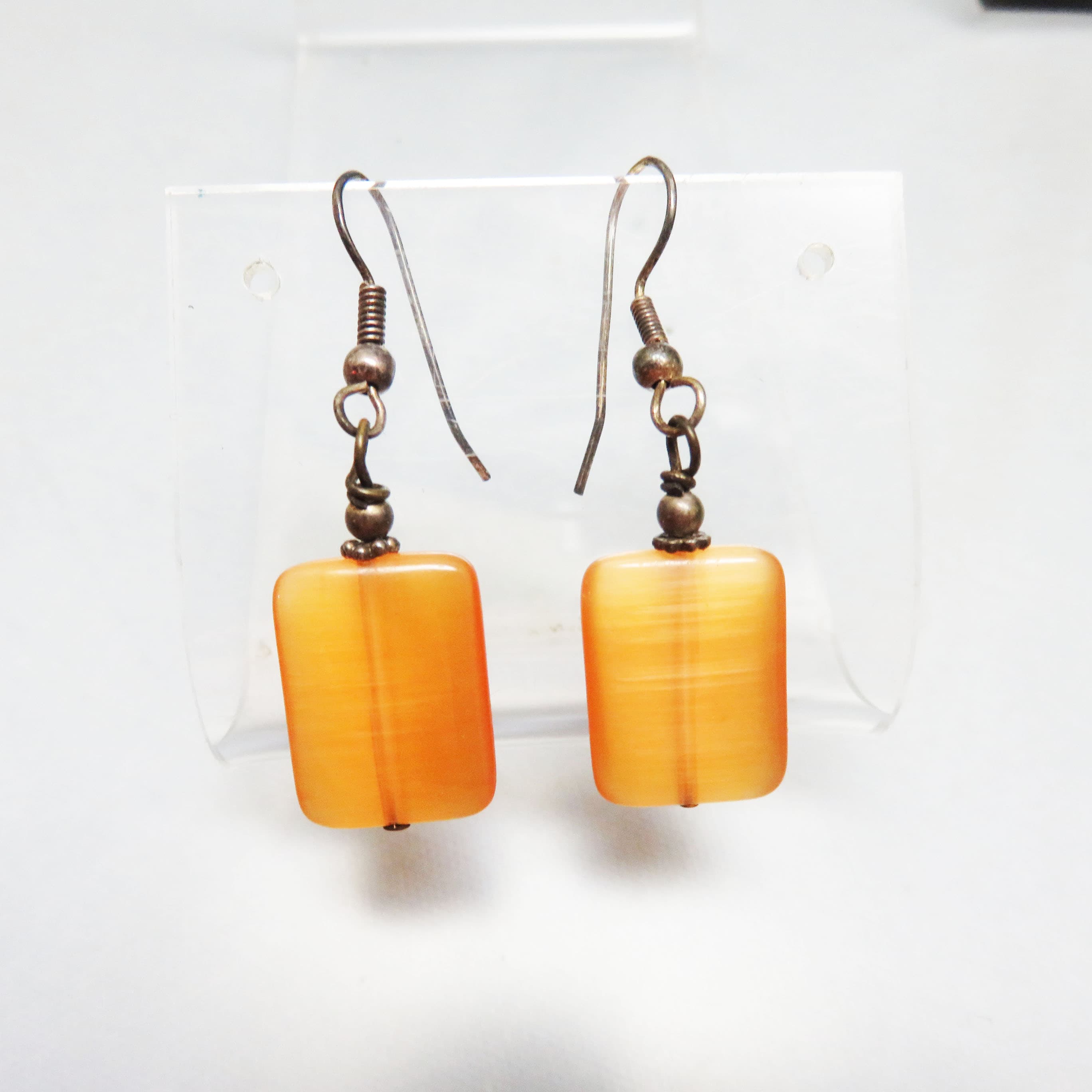 Orange Cats Eye Glass Pillow Bead Pierced Earrings