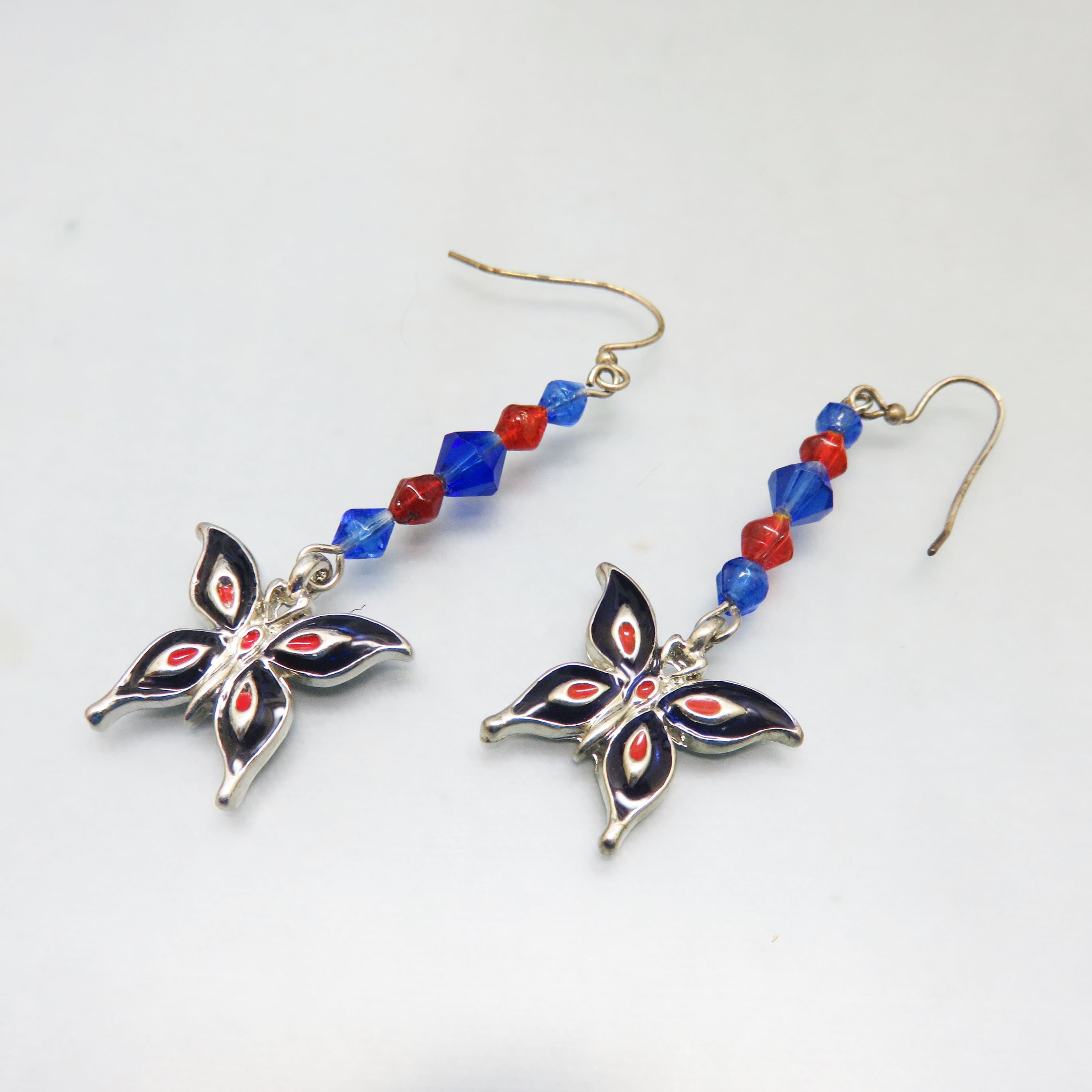 Enameled Butterfly Charm Pierced Earrings, Red and Blue Crystals
