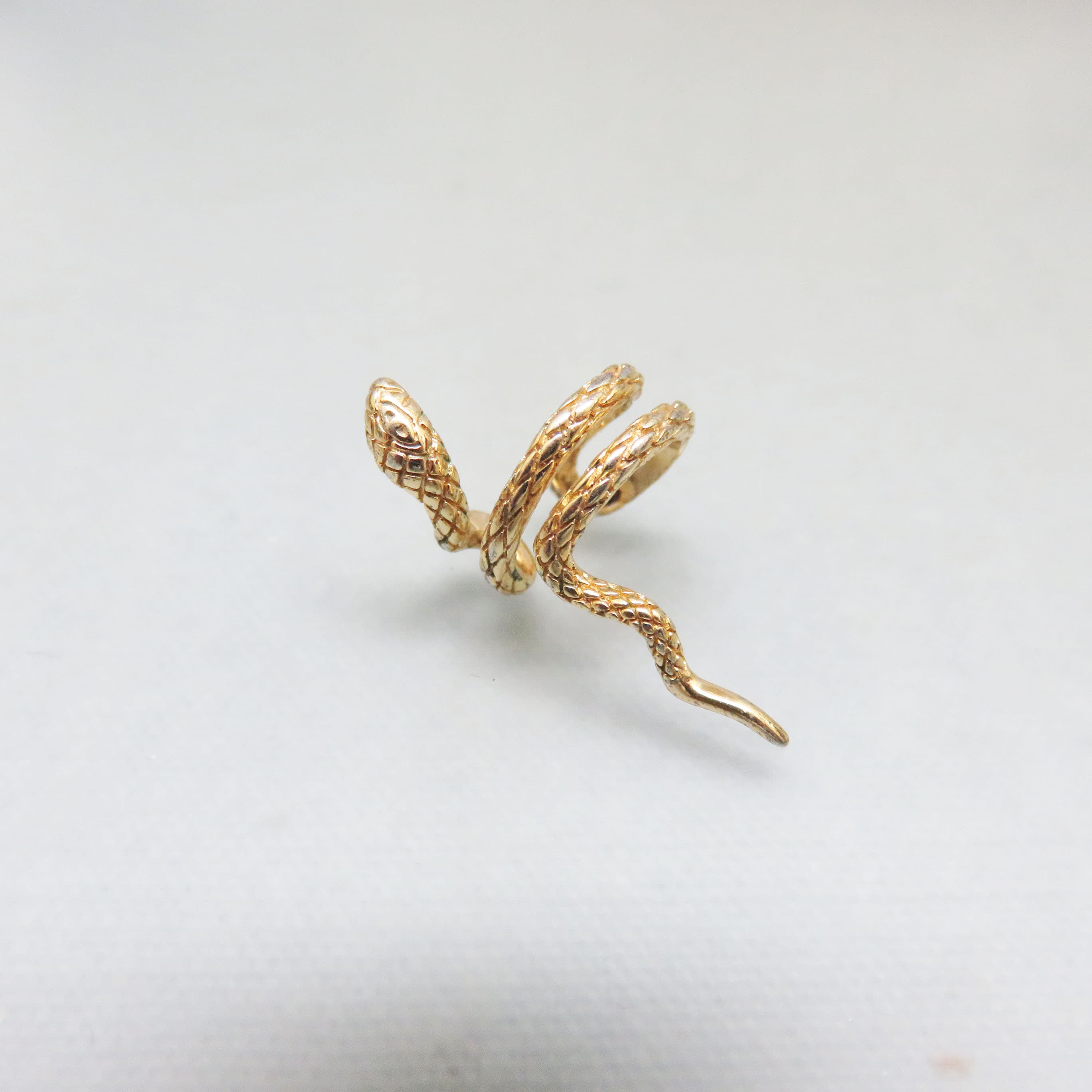 Coiled Goldtone Snake Ear Cuff