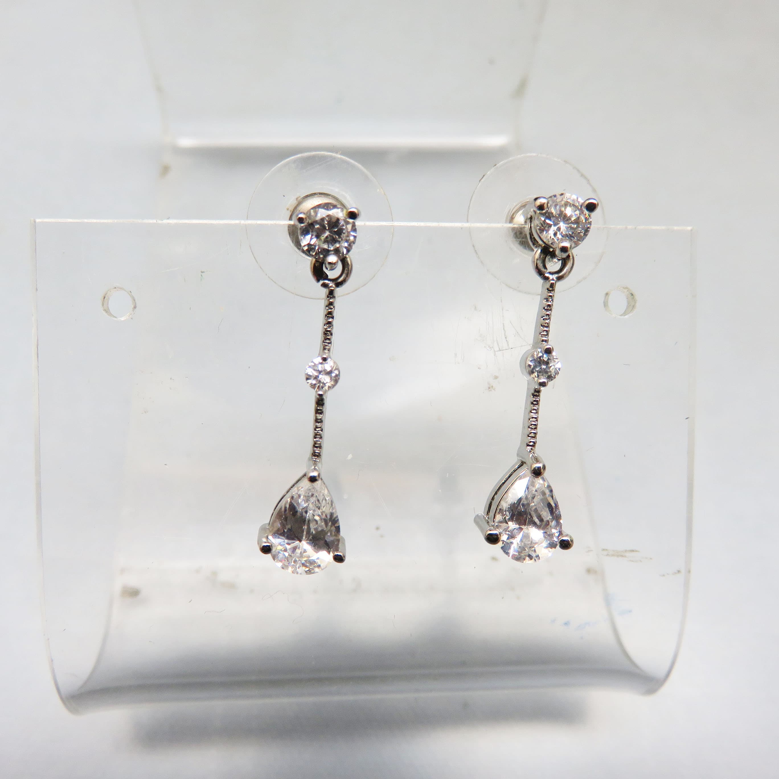 Clear CZ Teardrop Earrings – Silvertone Three Stone Bridal Dangles