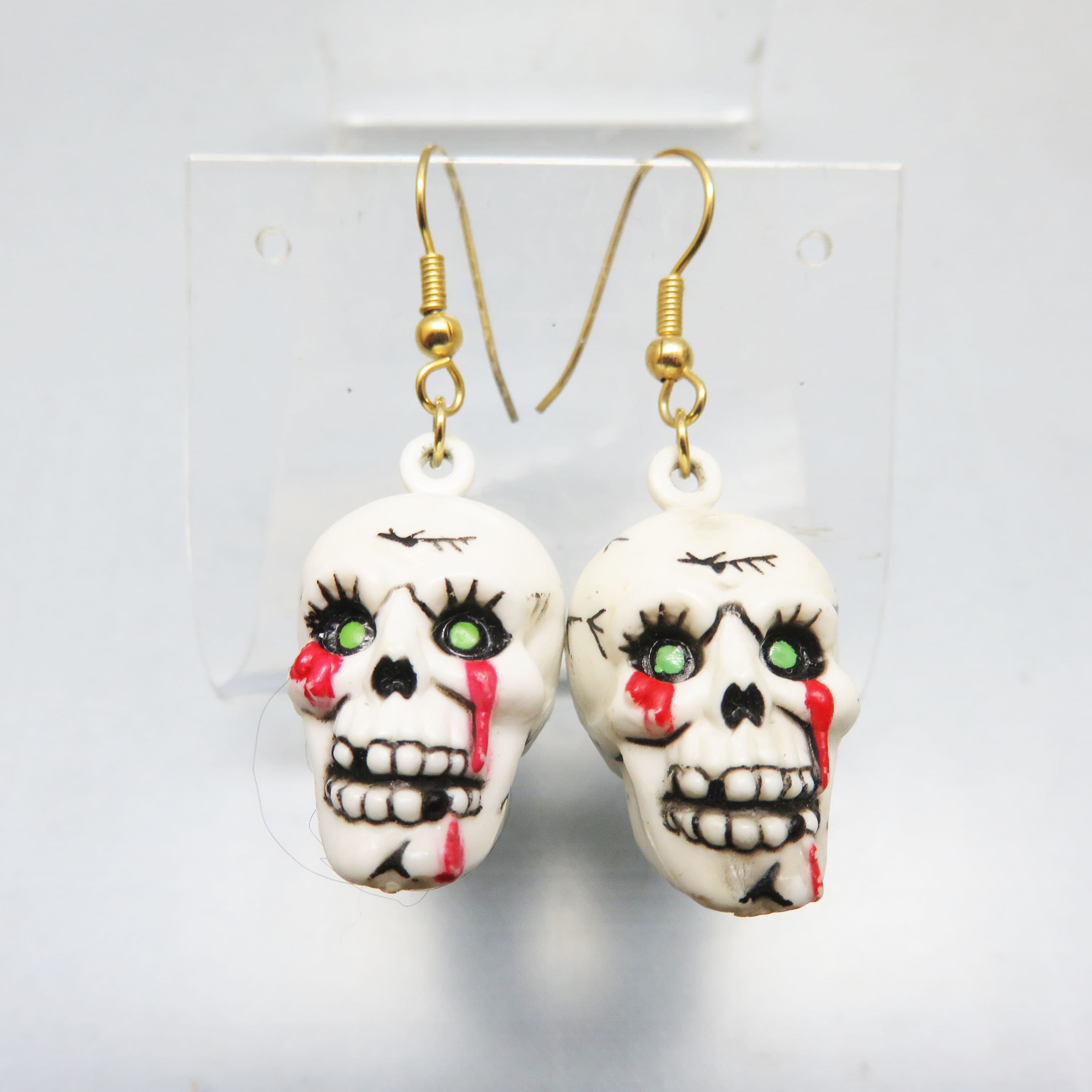 Hand-Painted Green-Eyed Skull Dangle Earrings
